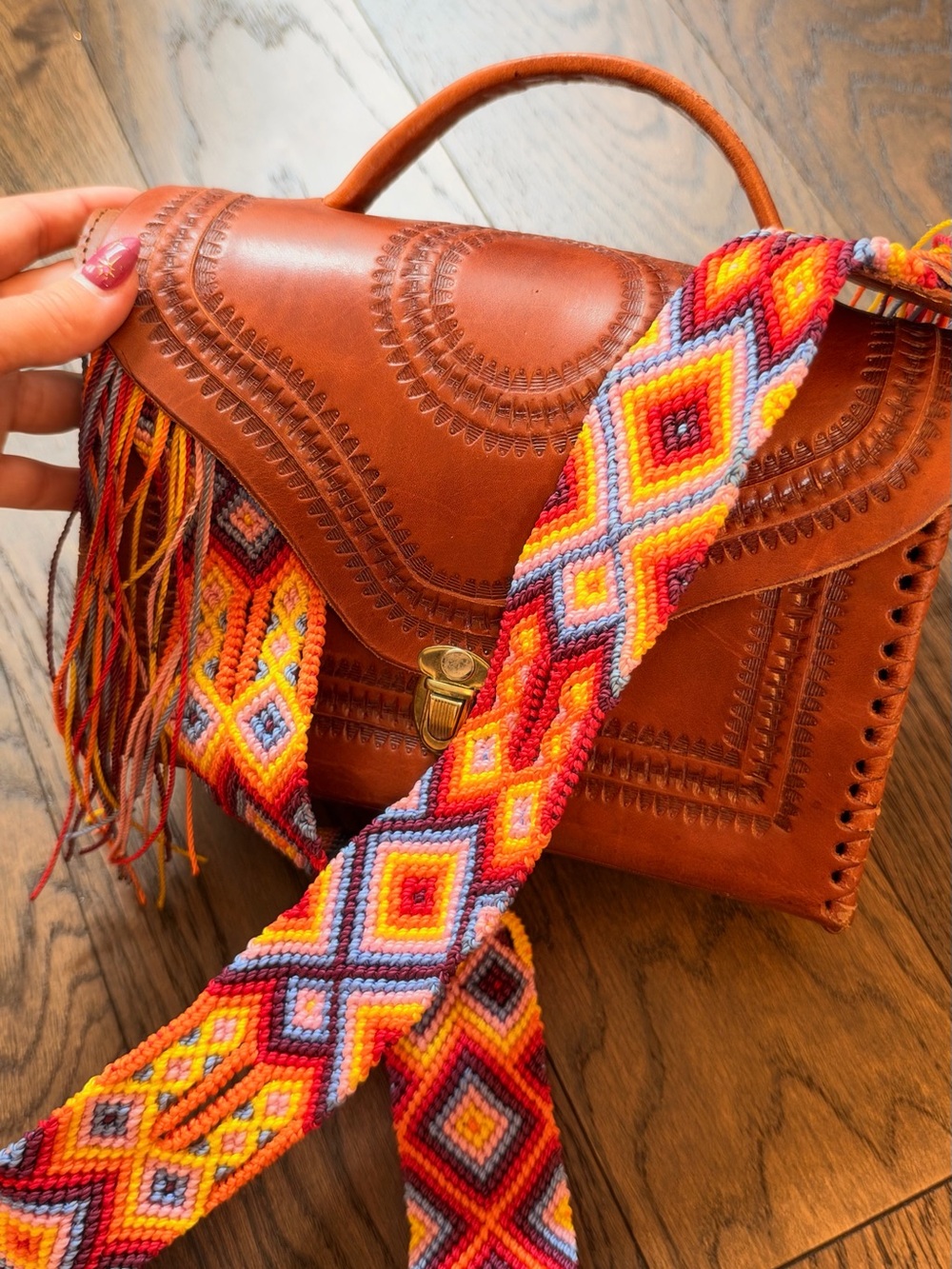 Handcrafted Brown Leather Crossbody Bag with Colorful Woven Strap